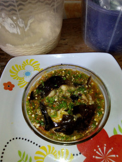 A picture of Okro soup with Fresh fish.