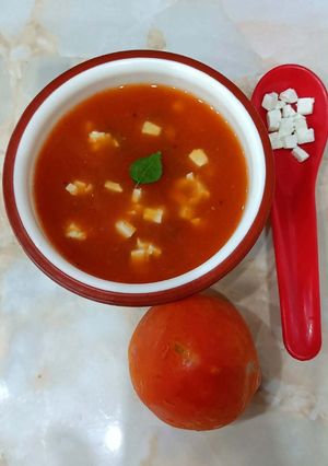 A picture of Tomato Paneer Soup.