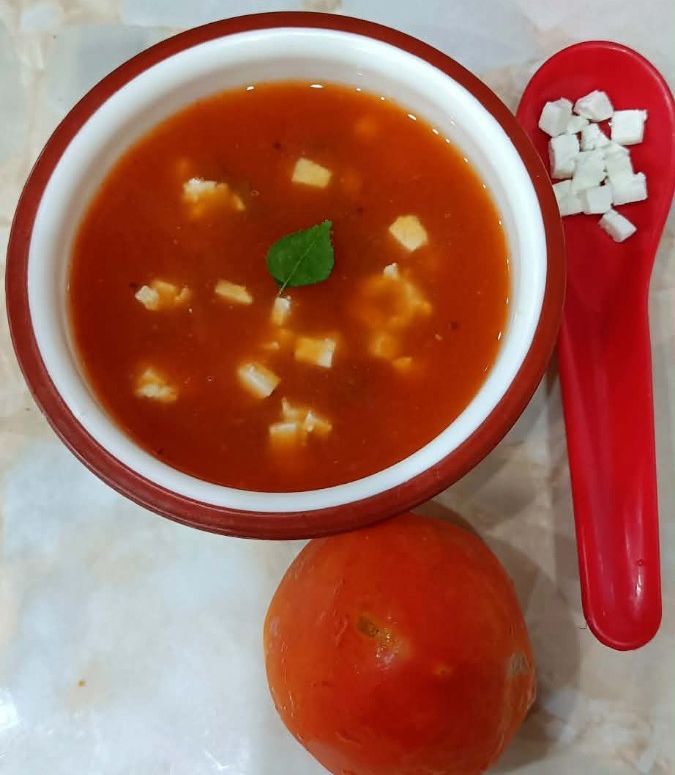 A picture of Tomato Paneer Soup.