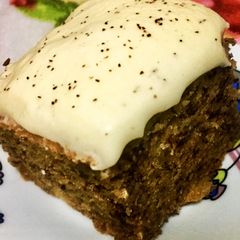 A picture of Banana cake with vanilla frosting.