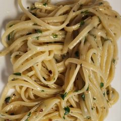A picture of Pasta with garlic and parsley.