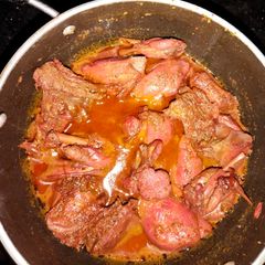 A picture of Red chicken recipe.