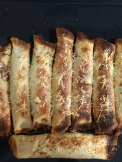Una foto de Canelones de espinaca y ricota con salsa blanca