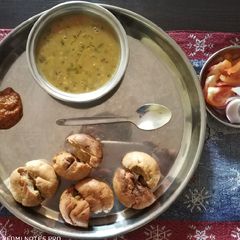 A picture of Daal Baati & lehsun Chutney.