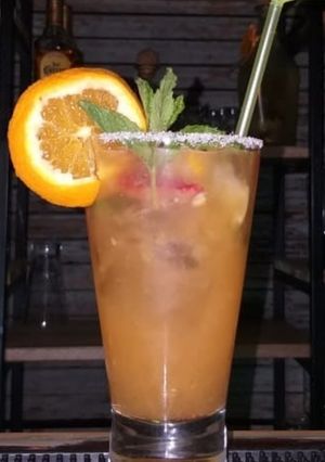 Una foto de Batido de mango y pelones