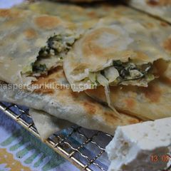 A picture of Stuffed Flat Naan Bread (Kelane/Bolani)نان کلانه.