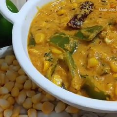 A picture of Sweet Corn Capsicum Curry.
