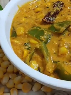 A picture of Sweet Corn Capsicum Curry.