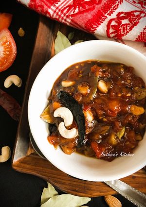 A picture of Nolen Gur diye Tomato Chutney (Tomato Chutney with Date Palm Jaggery - Bong style).