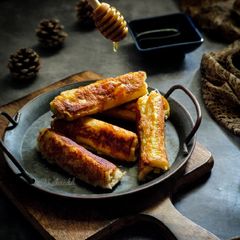 A picture of Apple stuffed french toast.