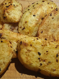 Una foto de Papas bravas a la parrilla