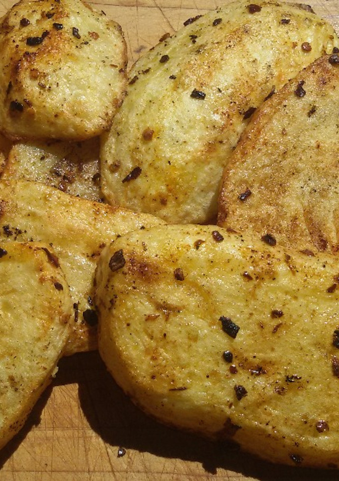 Una foto de Papas bravas a la parrilla