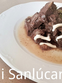 Una foto de Sangre de pollo encebollada