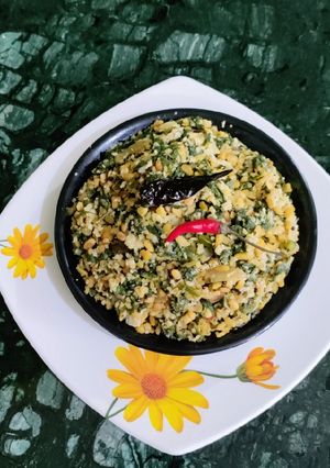 A picture of Pumpkin Saag(kumro) with Moong dal and Coconut.