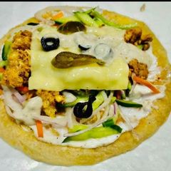 A picture of Cheesyy puri chicken parratha.