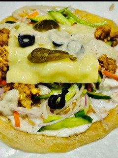 A picture of Cheesyy puri chicken parratha.