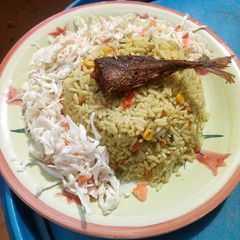 A picture of Fried rice and salad.