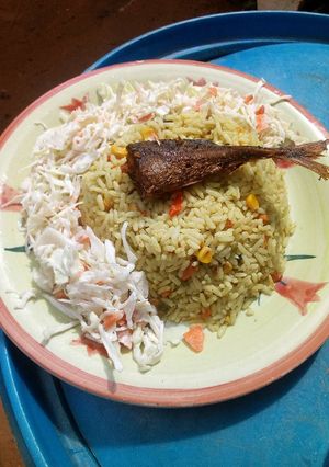 A picture of Fried rice and salad.