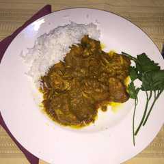 Una foto de Pollo al Curry hindú
