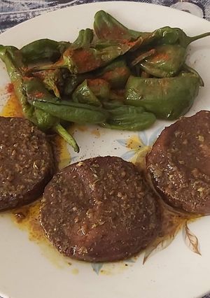 Foto principal de Rodajas de seitán y pimientos del padrón