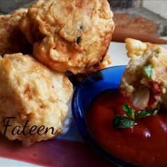A picture of Bread with stuffed potatoes.