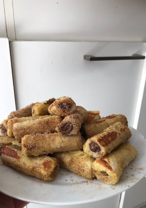 Una foto de Rollitos de Nutella💕