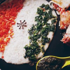 A picture of Tiranga Veggie Uttapam.
