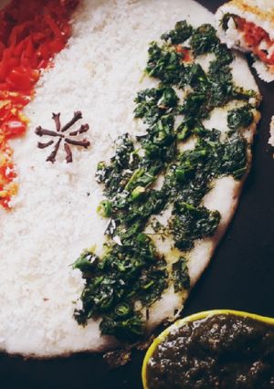 A picture of Tiranga Veggie Uttapam.