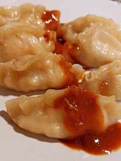 Una foto de Gyozas de suquet de rape y gambas