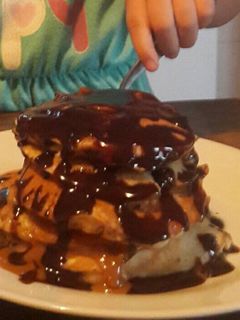Una foto de Panqueques rellenos de dulce de leche