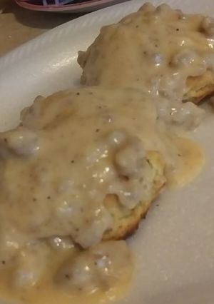 A picture of Italian-Seasoned Biscuits and Gravy.