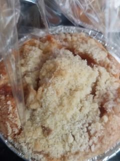 Una foto de Muffins de Crumble de coco y dulce de leche