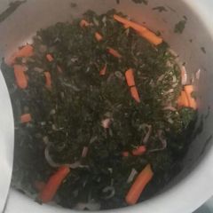 A picture of Fried carrots kales.