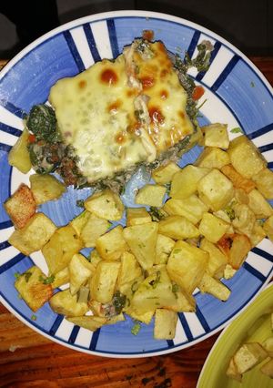 Una foto de Guiso de acelga con papas fritas