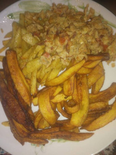A picture of Irish potatoes with fried eggs.
