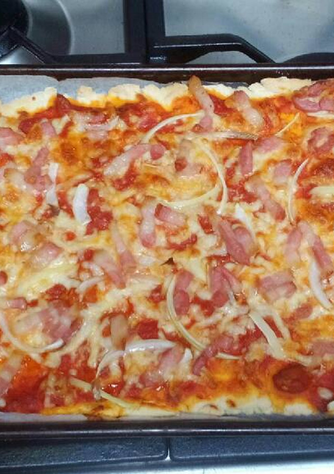 Una foto de Pizza casera de bacon