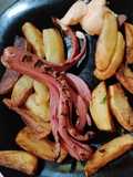 Tentacoli di wurstel e patate prezzemolate