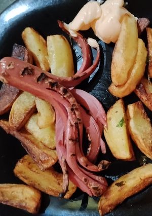 Foto di Tentacoli di wurstel e patate prezzemolate
