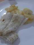 Panga al horno con patatas y cebolla