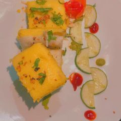 A picture of Cheesy fusion dhokla.