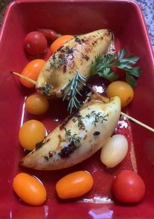 Une photo de Calamars 🦑 au festival des herbes 🌿 aromatiques🧜 à la marseillaise