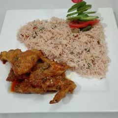 A picture of Hot And Spicy Chicken Wings with Masala Rice.