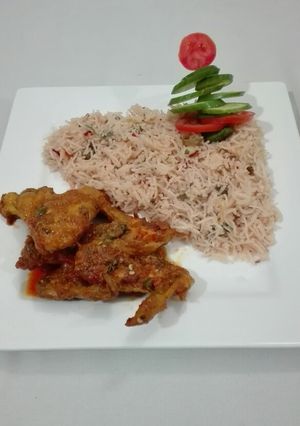 A picture of Hot And Spicy Chicken Wings with Masala Rice.