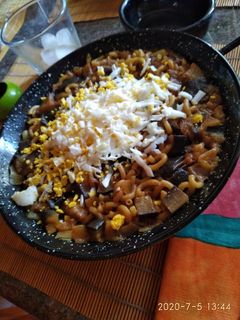 Una foto de Fideuá ovovegetariana