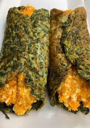 Una foto de Canelones de espinaca con calabaza y ricota