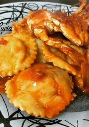 A picture of Fresh Ravioli Stuffed with Potatoes and Salted Cod with Crab Sauce.