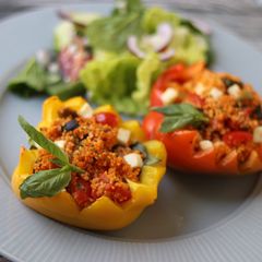 A picture of Stuffed peppers with Thai red curry couscous 🫑 🍅.