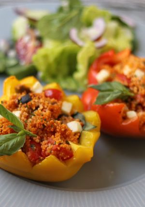 A picture of Stuffed peppers with Thai red curry couscous 🫑 🍅.