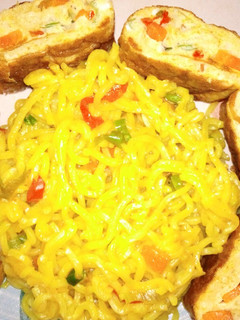A picture of Egg omelette with noodles.