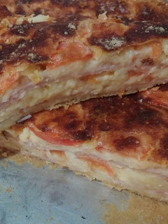 Una foto de Torta Fainá de Jamón, Queso y Tomate, en licuadora